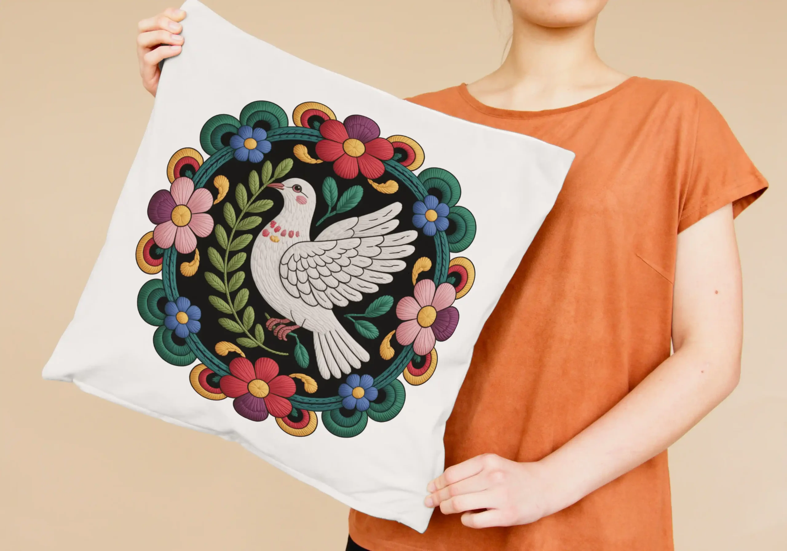 Bohemian Dove Embroidery Art - Peace Bird Floral Mandala 1 Woman holding a square pillow printed with bohemian dove embroidery art featuring colorful flowers and a peace bird mandala, ideal for home decor and POD products.